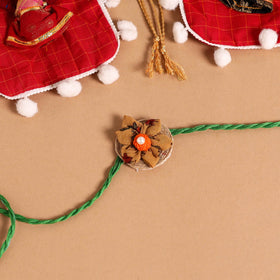  Handmade Fabric Flower Jute Rakhi (Set of 2)