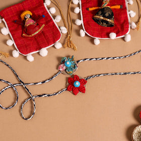  Handmade Fabric Flower Jute Rakhi (Set of 2)