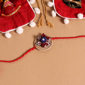  Handmade Fabric Flower Jute Rakhi (Set of 2)