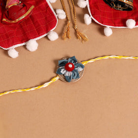 Handmade Fabric Flower Jute Rakhi (Set of 2)