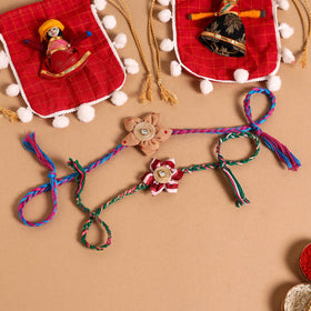  Handmade Fabric Flower Jute Rakhi (Set of 2)