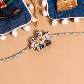  Handmade Fabric Flower Jute Rakhi (Set of 2)