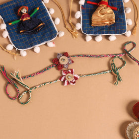  Handmade Fabric Flower Jute Rakhi (Set of 2)