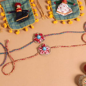  Handmade Fabric Flower Jute Rakhi (Set of 2)