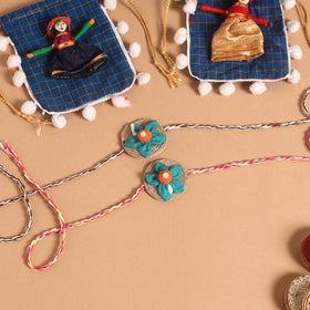  Handmade Fabric Flower Jute Rakhi (Set of 2)