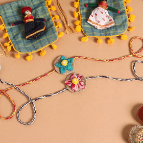  Handmade Fabric Flower Jute Rakhi (Set of 2)