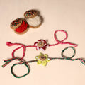  Handmade Fabric Flower Jute Rakhi (Set of 2)
