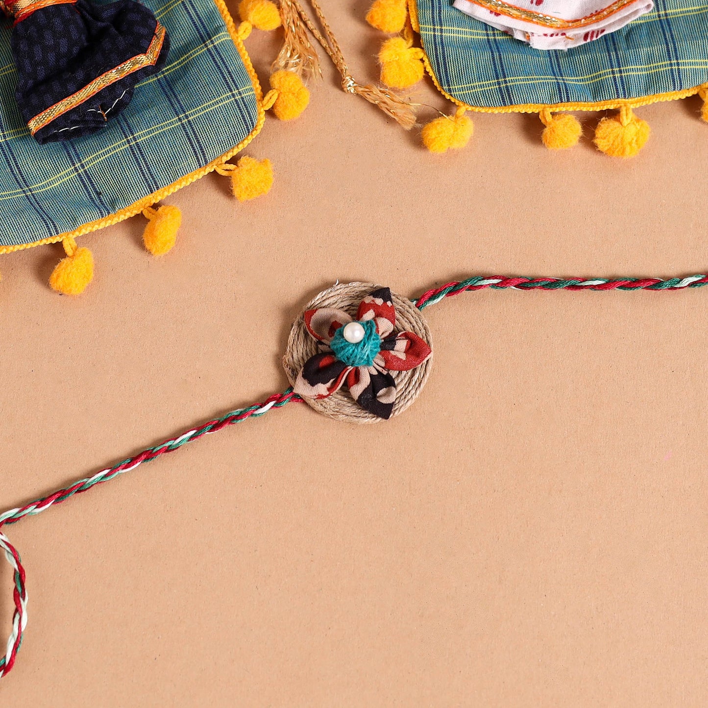  Handmade Fabric Flower Jute Rakhi (Set of 2)