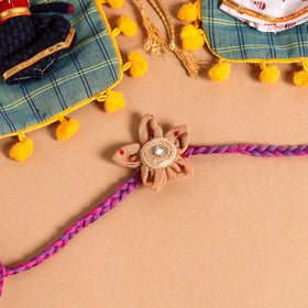  Handmade Fabric Flower Jute Rakhi (Set of 2)