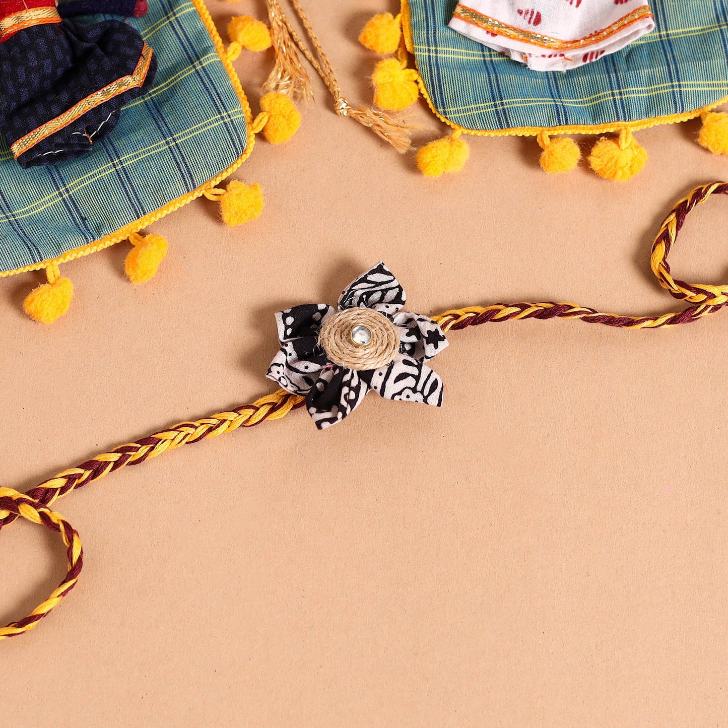  Handmade Fabric Flower Jute Rakhi (Set of 2)