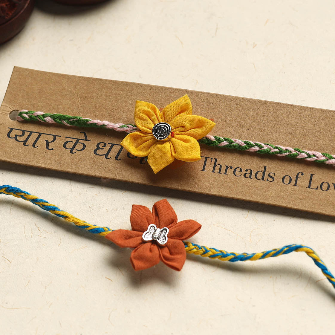 Handmade Fabric Flower Rakhi (Assorted Set of 2)