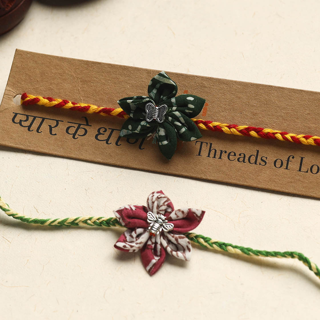 Handmade Fabric Flower Rakhi (Assorted Set of 2)