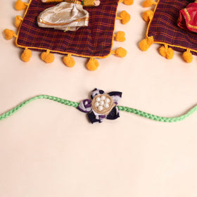  Handmade Fabric Flower Rakhi (Set of 2)