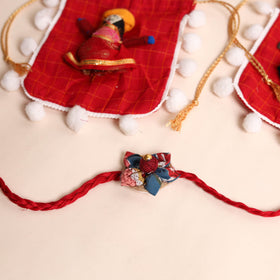  Handmade Fabric Flower Rakhi (Set of 2)