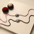 Handmade German Silver Rakhi (Set of 2)