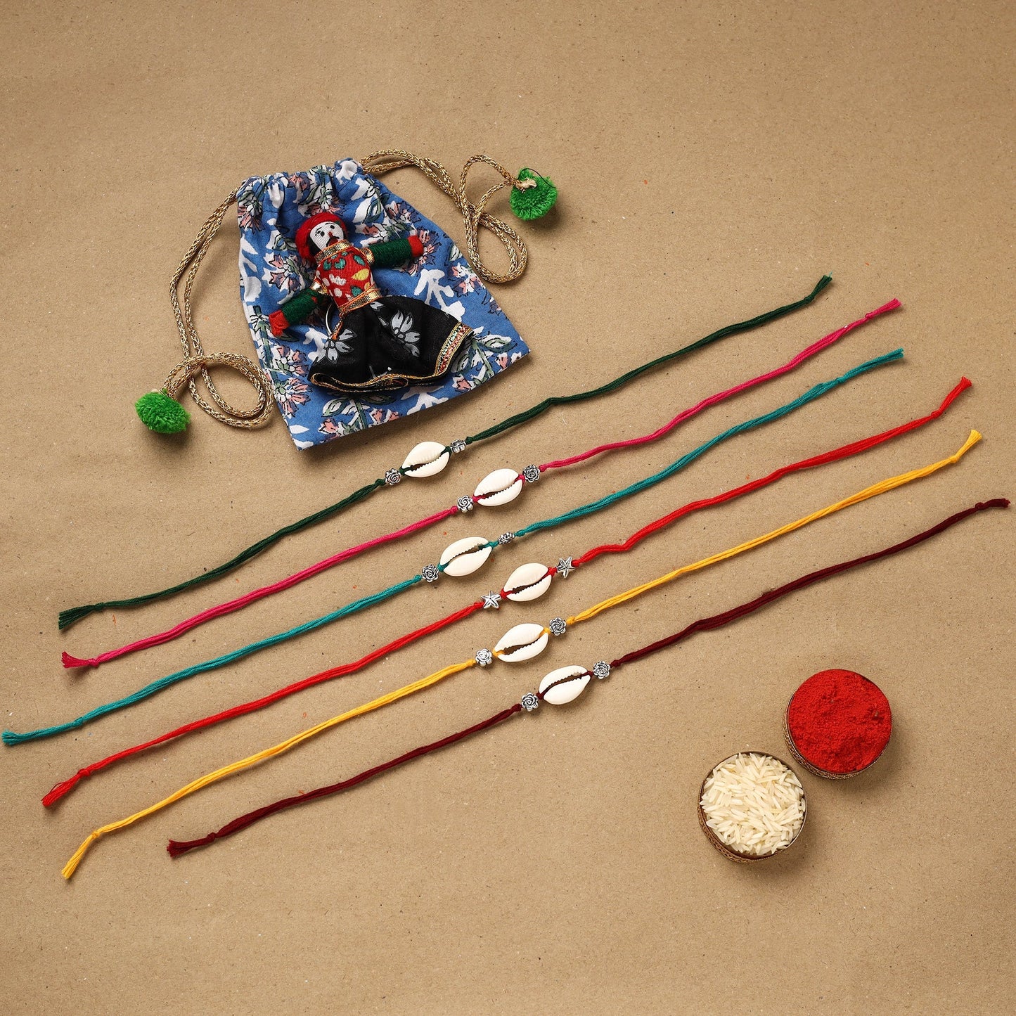Handmade jute fabart shell work rakhi (set of 6) 159