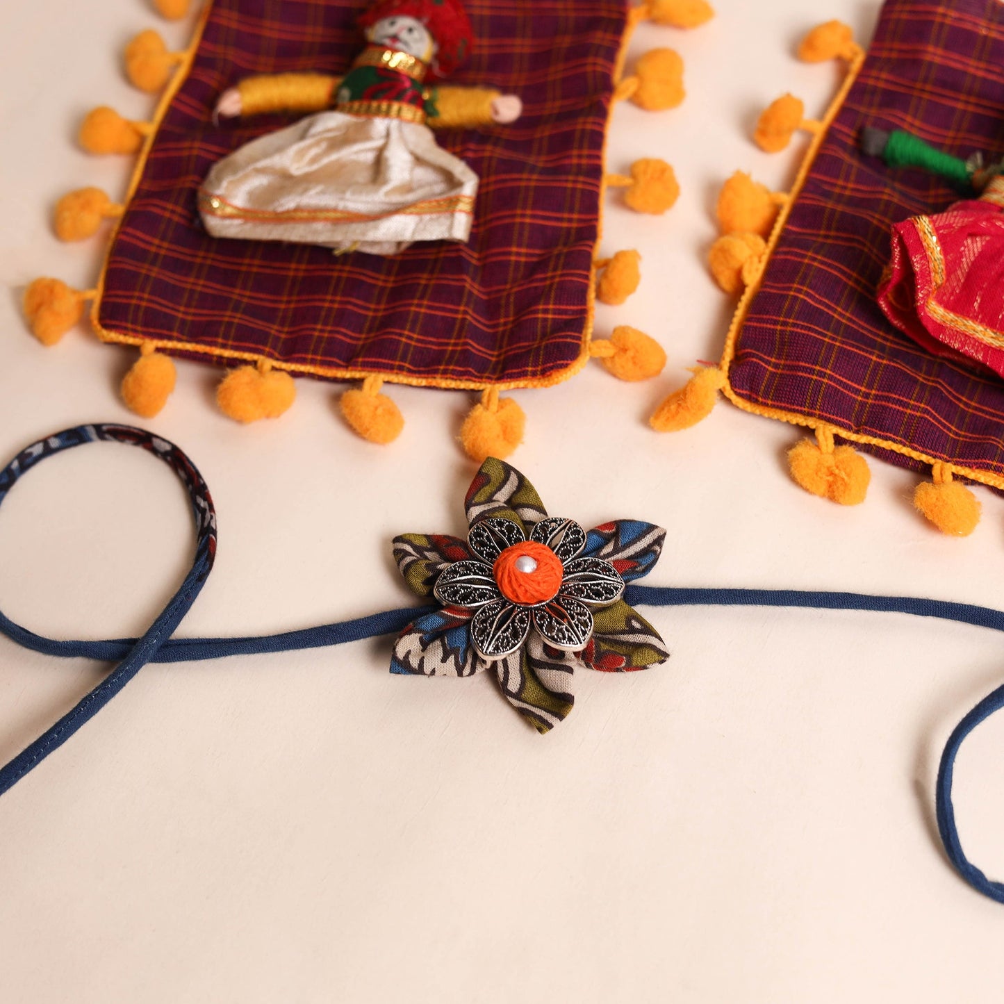  Handmade GS Fabric Flower Rakhi (Set of 2)