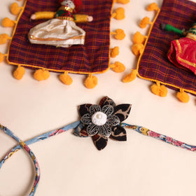  Handmade GS Fabric Flower Rakhi (Set of 2)