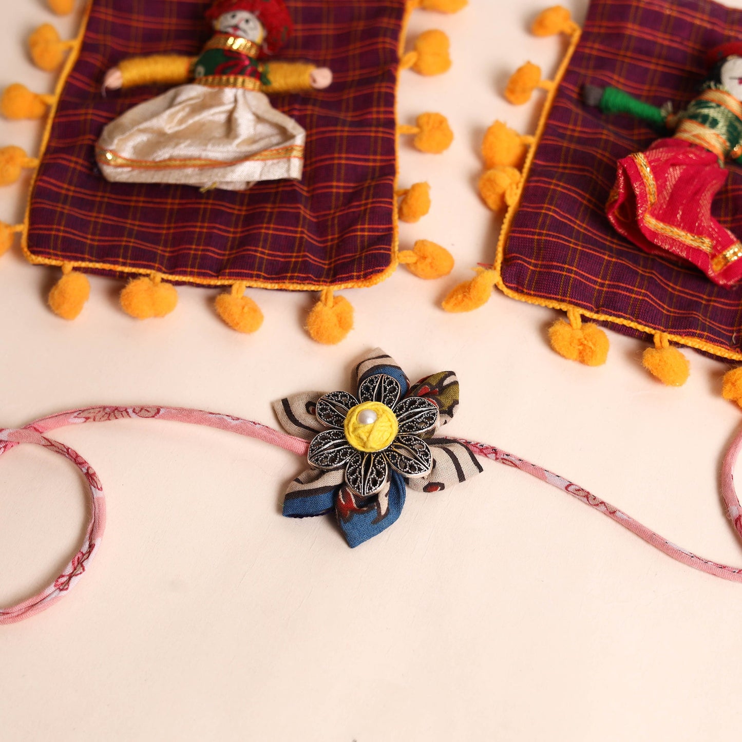  Handmade GS Fabric Flower Rakhi (Set of 2)