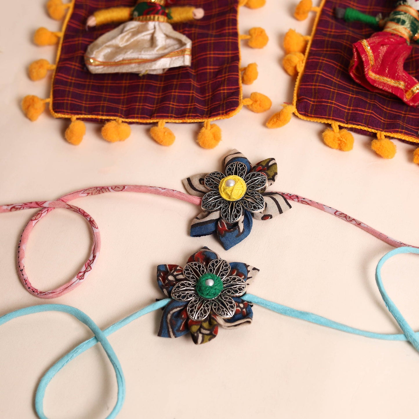  Handmade GS Fabric Flower Rakhi (Set of 2)