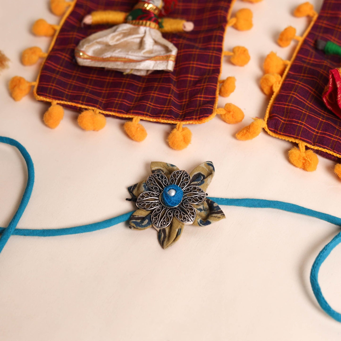  Handmade GS Fabric Flower Rakhi (Set of 2)