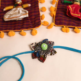  Handmade GS Fabric Flower Rakhi (Set of 2)