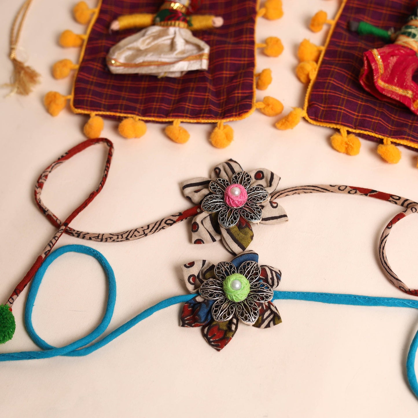  Handmade GS Fabric Flower Rakhi (Set of 2)