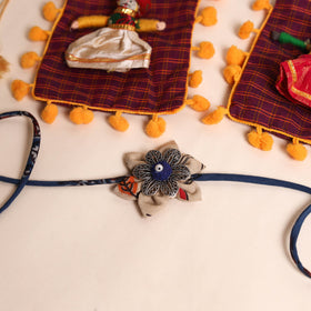  Handmade GS Fabric Flower Rakhi (Set of 2)