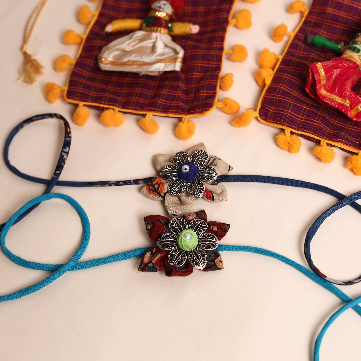  Handmade GS Fabric Flower Rakhi (Set of 2)