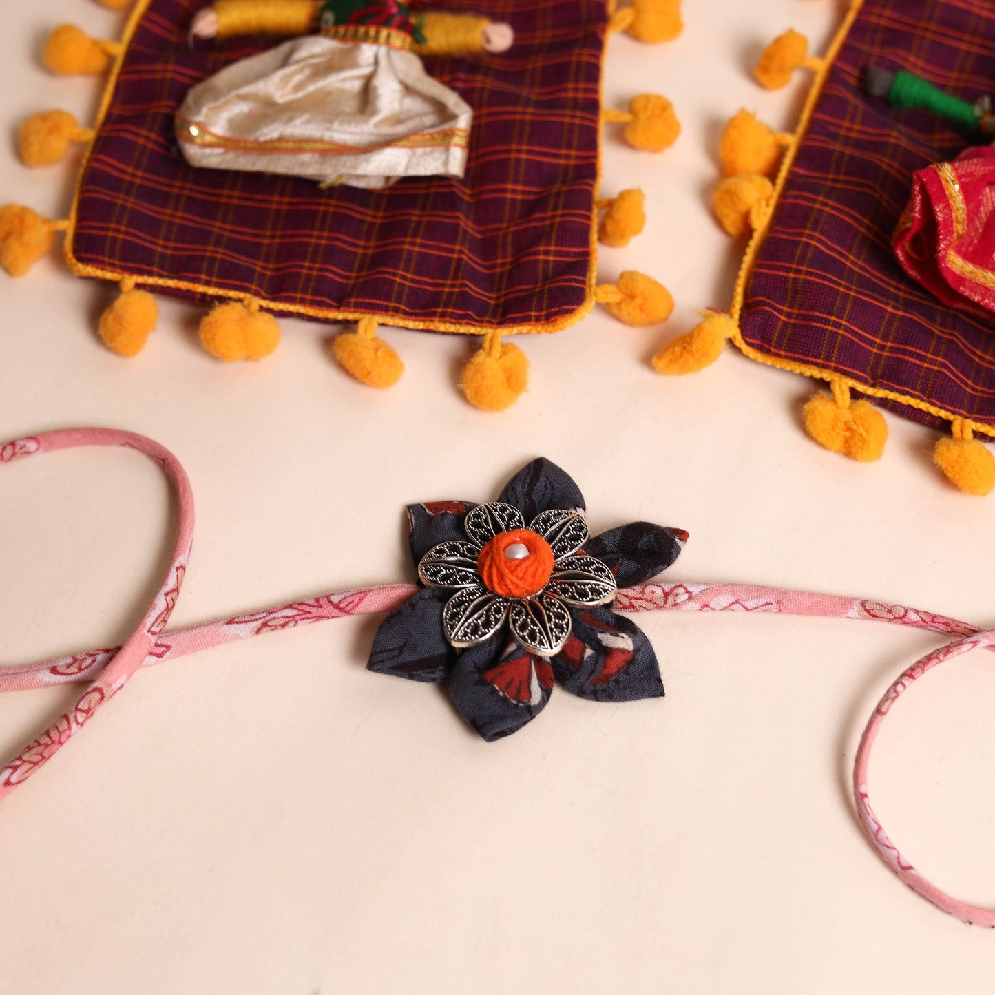  Handmade GS Fabric Flower Rakhi (Set of 2)