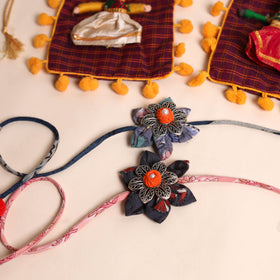  Handmade GS Fabric Flower Rakhi (Set of 2)
