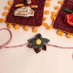  Handmade GS Fabric Flower Rakhi (Set of 2)