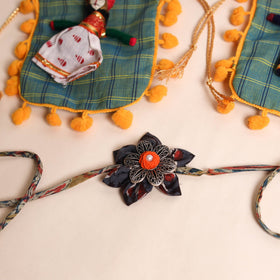  Handmade GS Fabric Flower Rakhi (Set of 2)