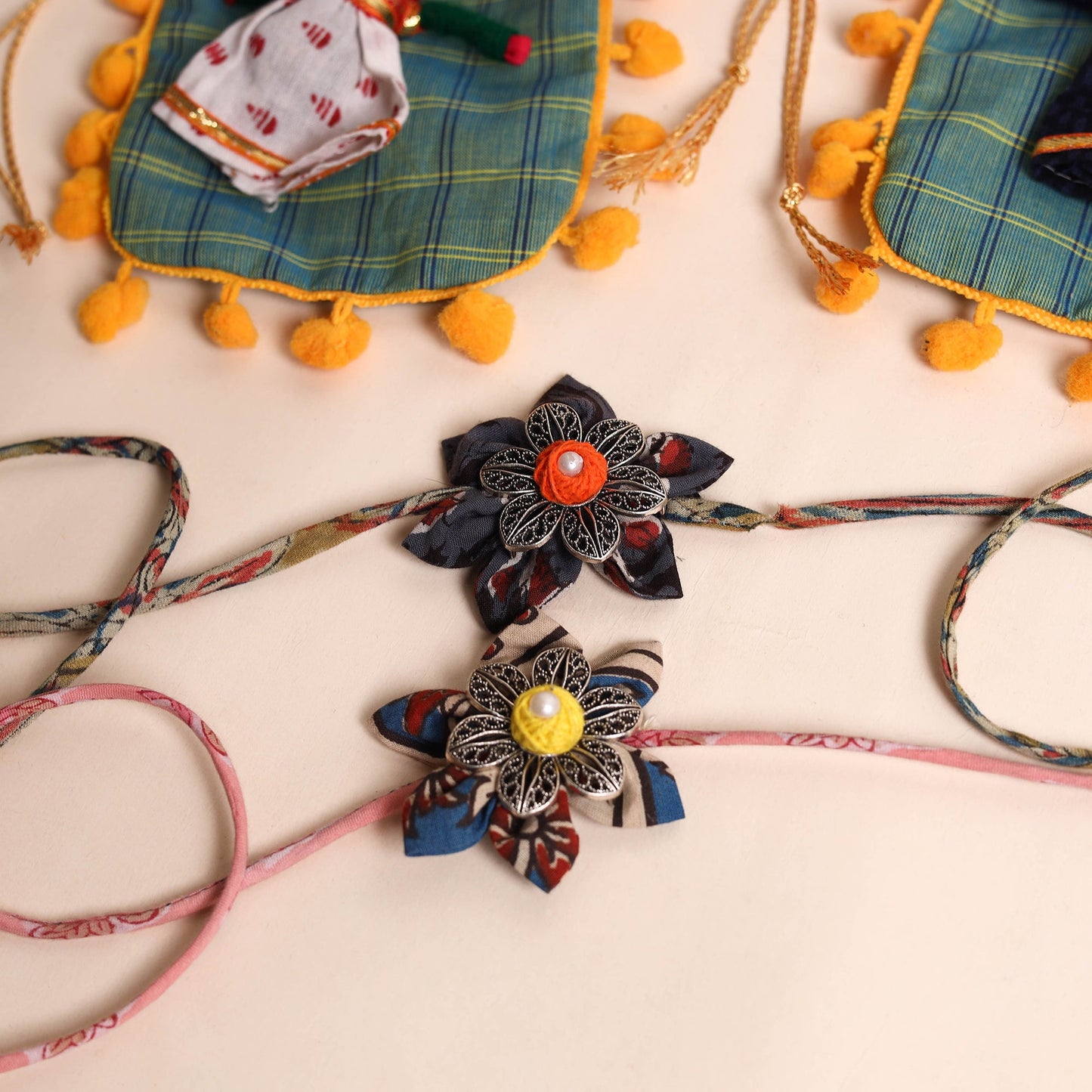  Handmade GS Fabric Flower Rakhi (Set of 2)