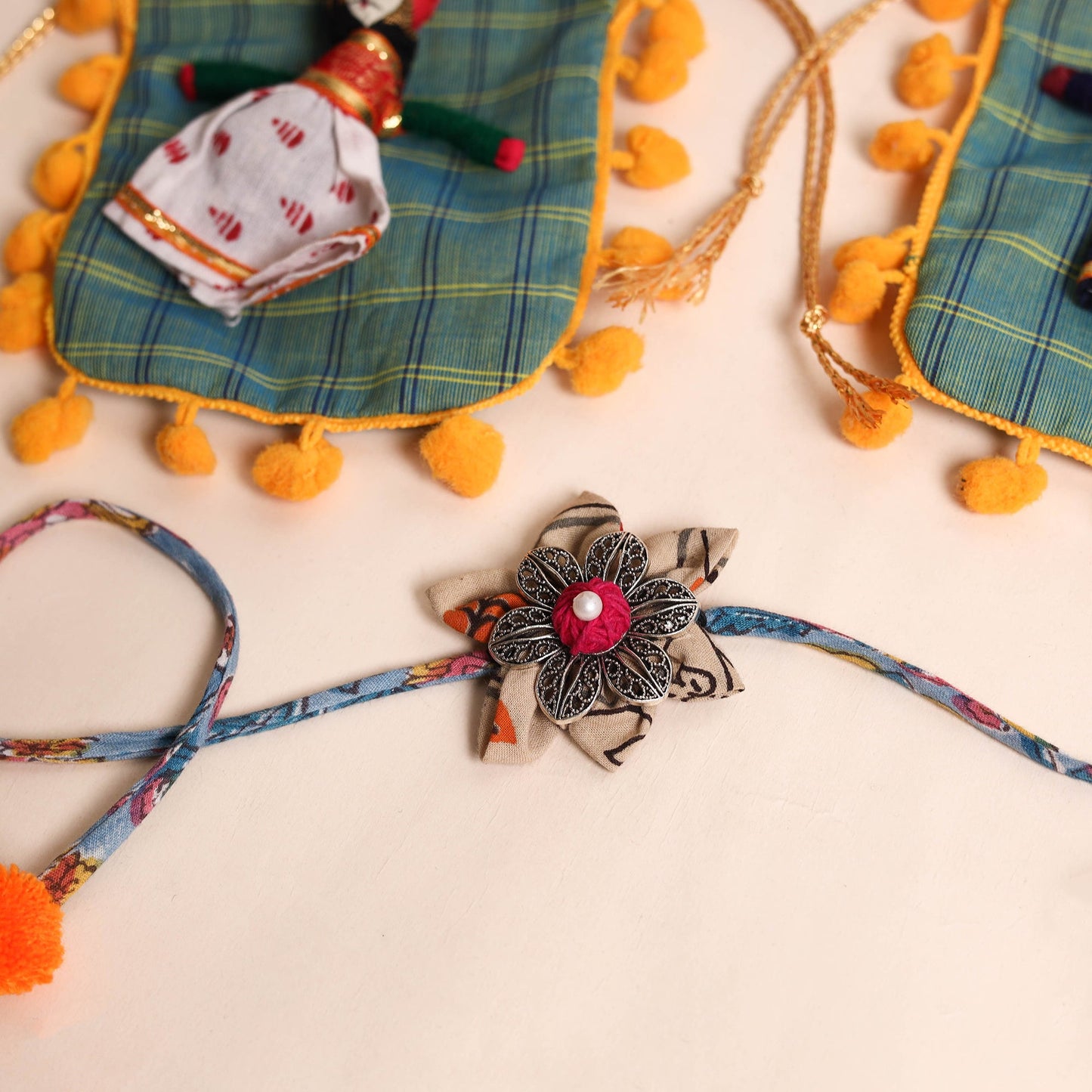  Handmade GS Fabric Flower Rakhi (Set of 2)