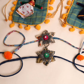  Handmade GS Fabric Flower Rakhi (Set of 2)