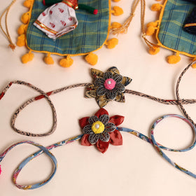  Handmade GS Fabric Flower Rakhi (Set of 2)