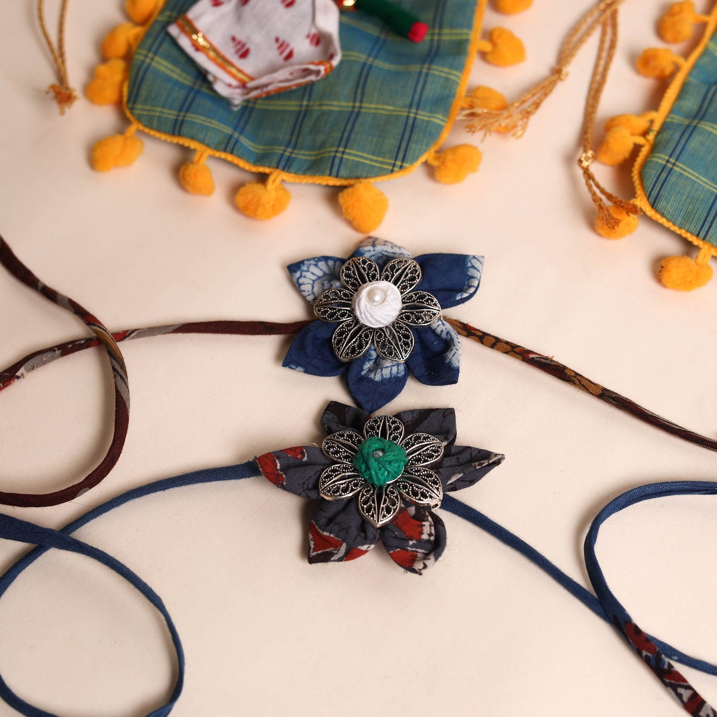  Handmade GS Fabric Flower Rakhi (Set of 2)