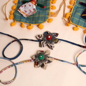  Handmade GS Fabric Flower Rakhi (Set of 2)