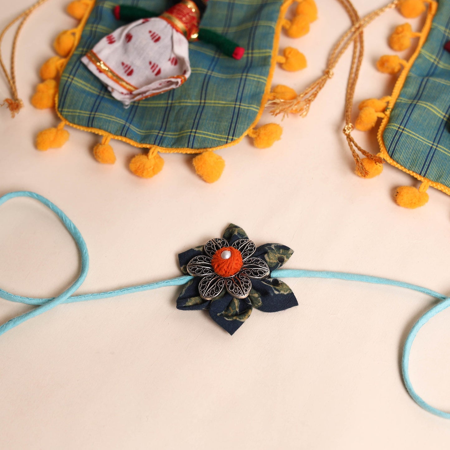  Handmade GS Fabric Flower Rakhi (Set of 2)