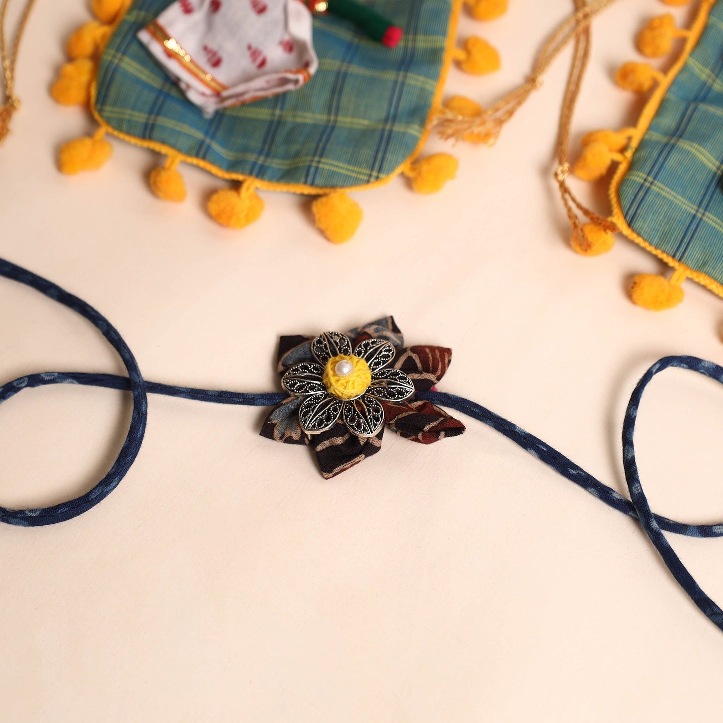  Handmade GS Fabric Flower Rakhi (Set of 2)