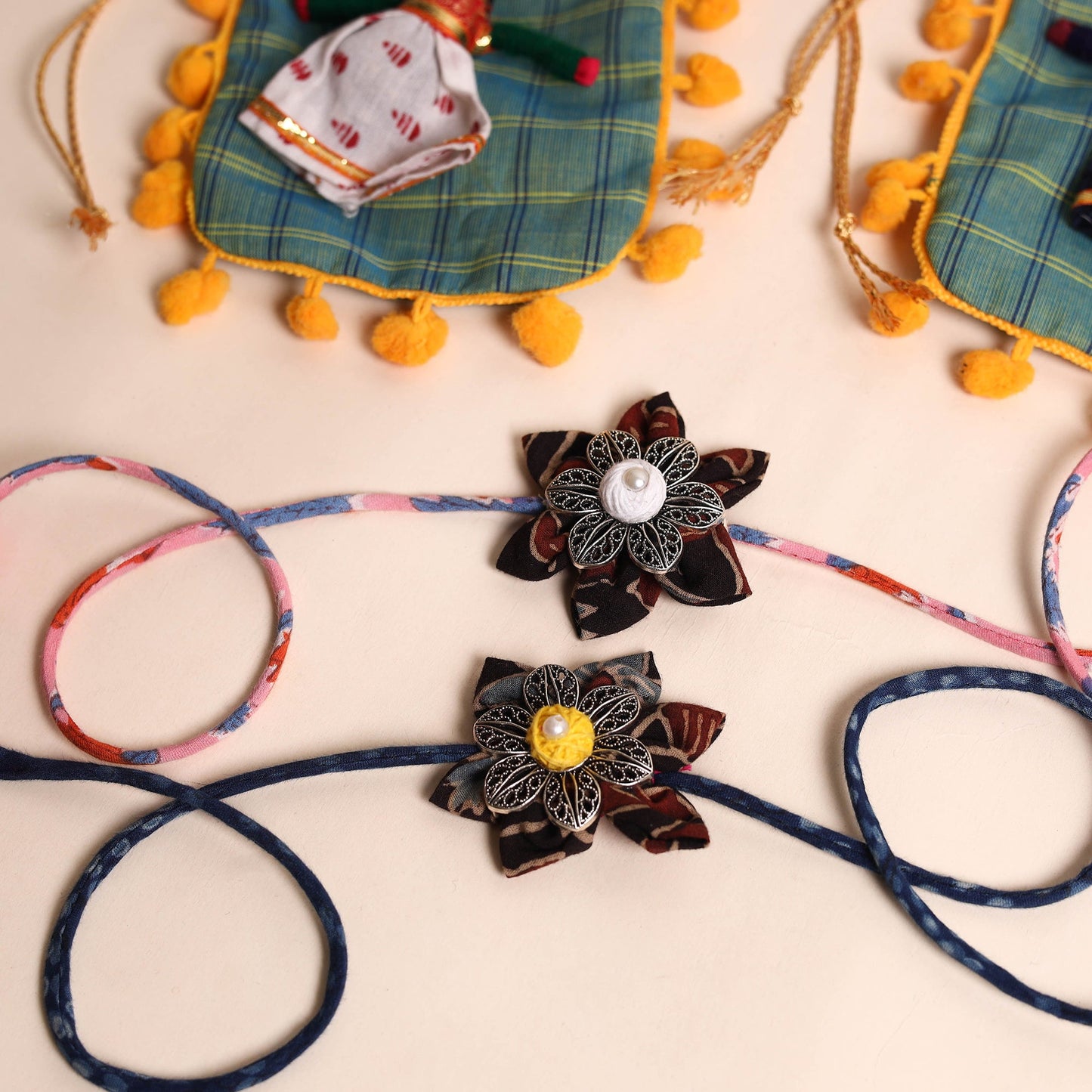  Handmade GS Fabric Flower Rakhi (Set of 2)