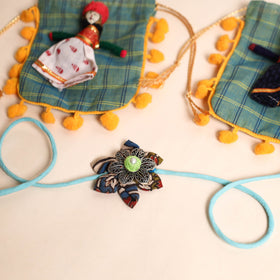  Handmade GS Fabric Flower Rakhi (Set of 2)