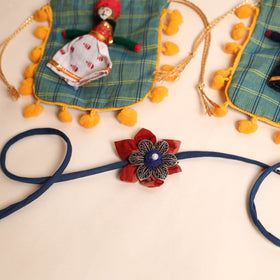  Handmade GS Fabric Flower Rakhi (Set of 2)