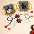  Handmade GS Fabric Flower Rakhi (Set of 2)