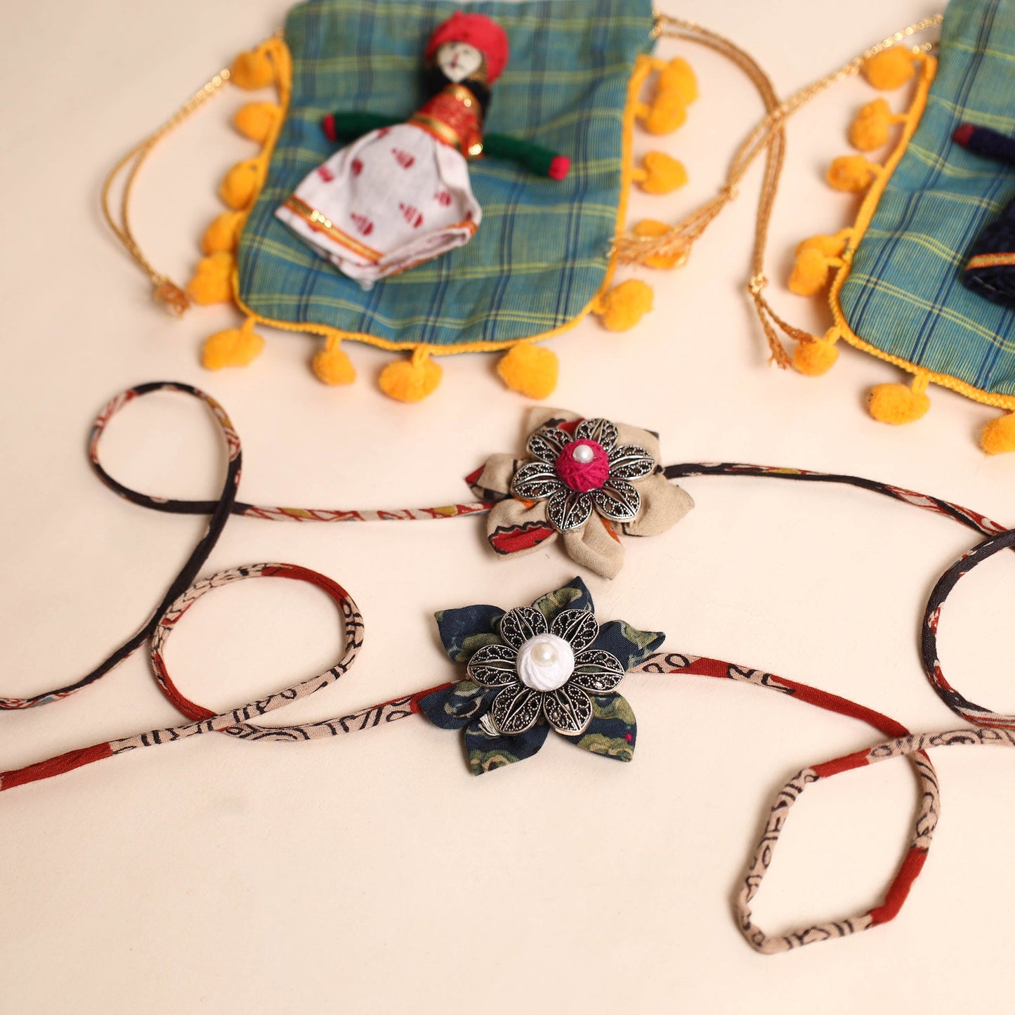  Handmade GS Fabric Flower Rakhi (Set of 2)