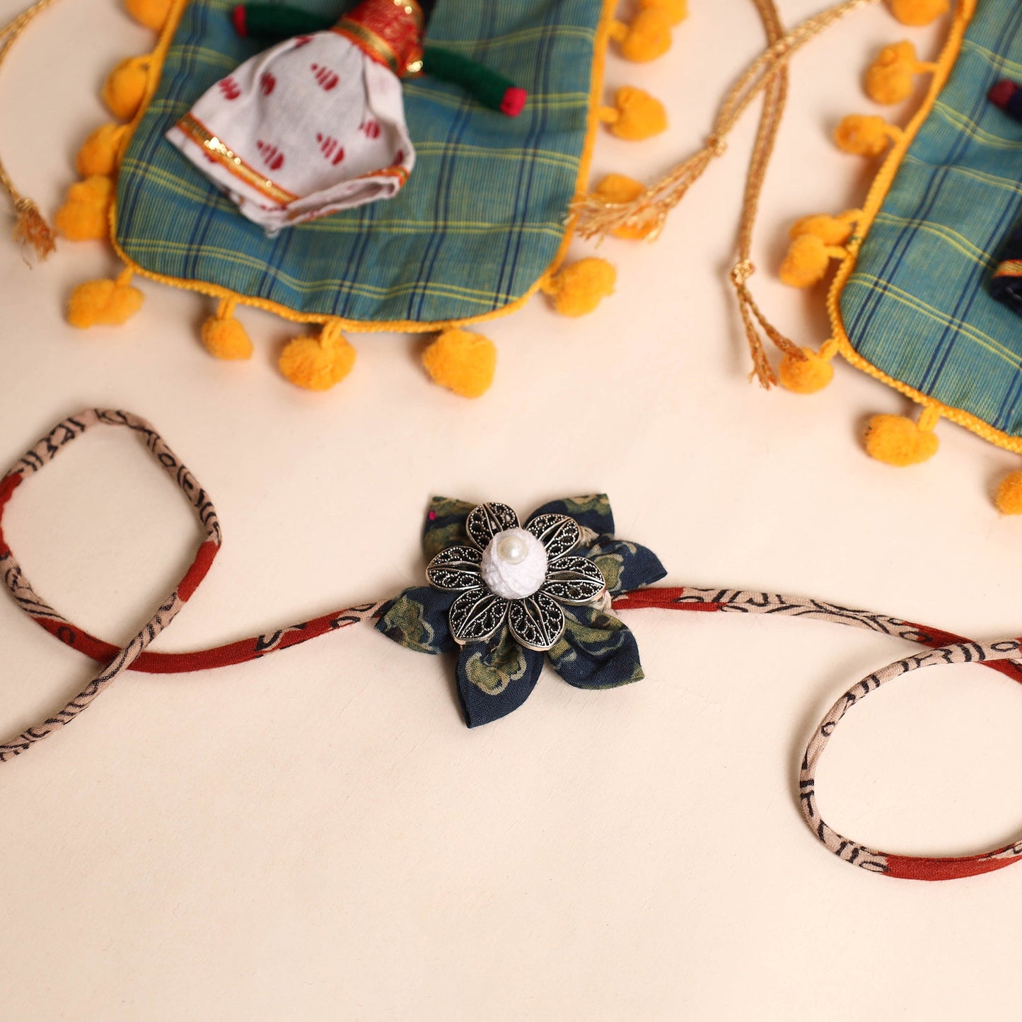  Handmade GS Fabric Flower Rakhi (Set of 2)