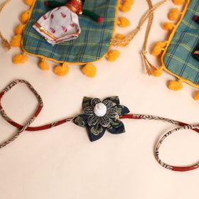  Handmade GS Fabric Flower Rakhi (Set of 2)