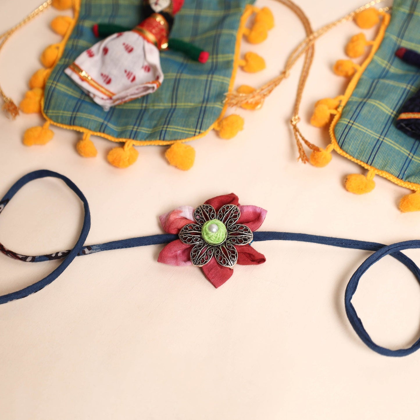  Handmade GS Fabric Flower Rakhi (Set of 2)