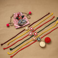 Handmade jute fabart shell work rakhi (set of 6) 153